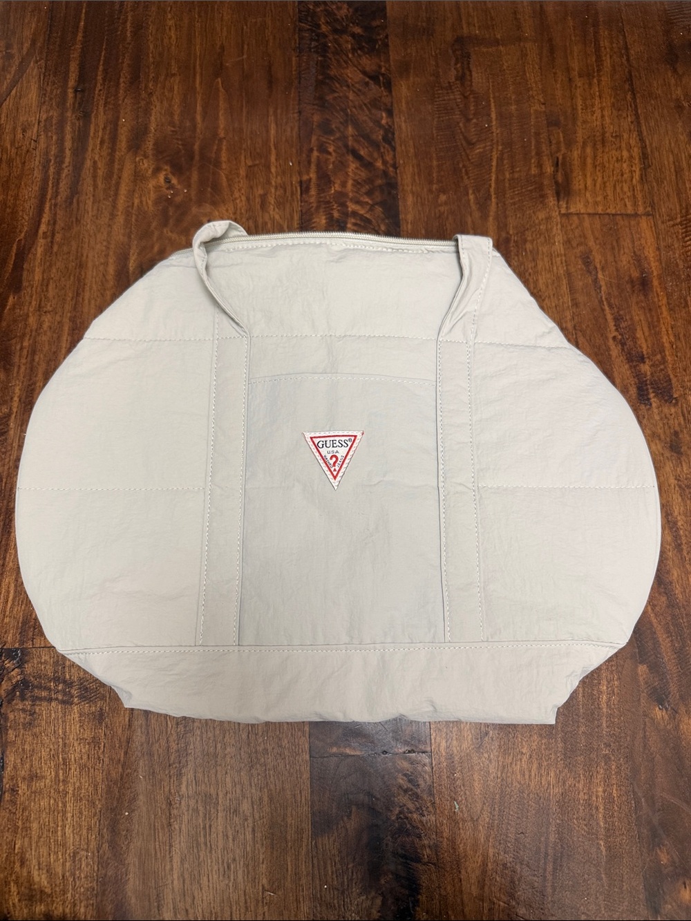 GUESS Pale Gray Round Tote with Signature Triangle Logo
